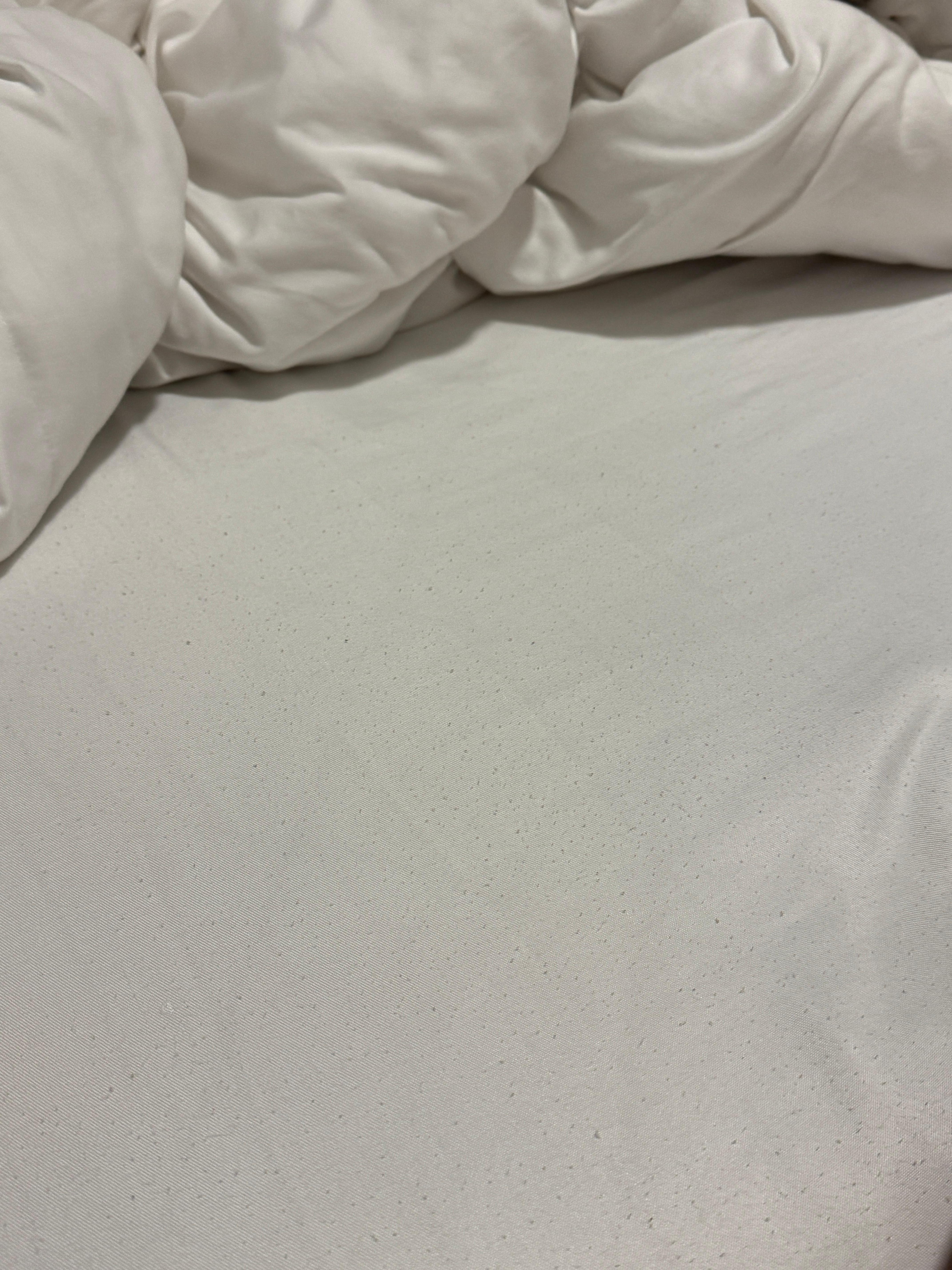 Lint balls on bedsheet 