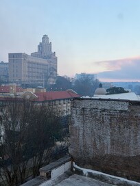 Outside our room. Nice view of the street & nice view of the sunset reflecting on the clouds.