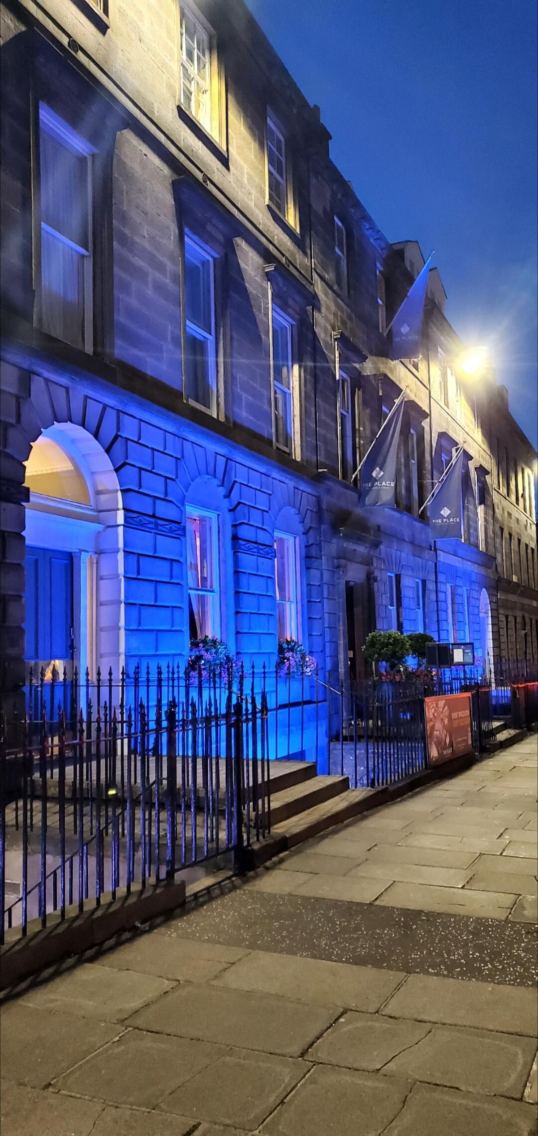 The entrance, beautifully lit up at night.