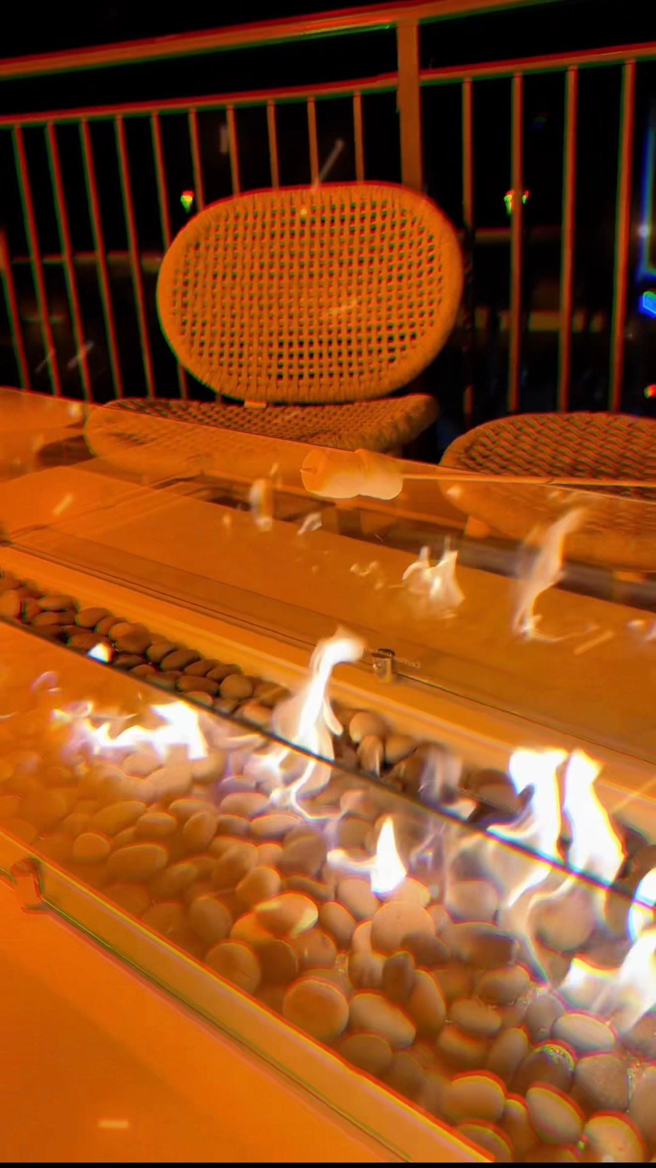 Fire place on second floor overlooking the beach 