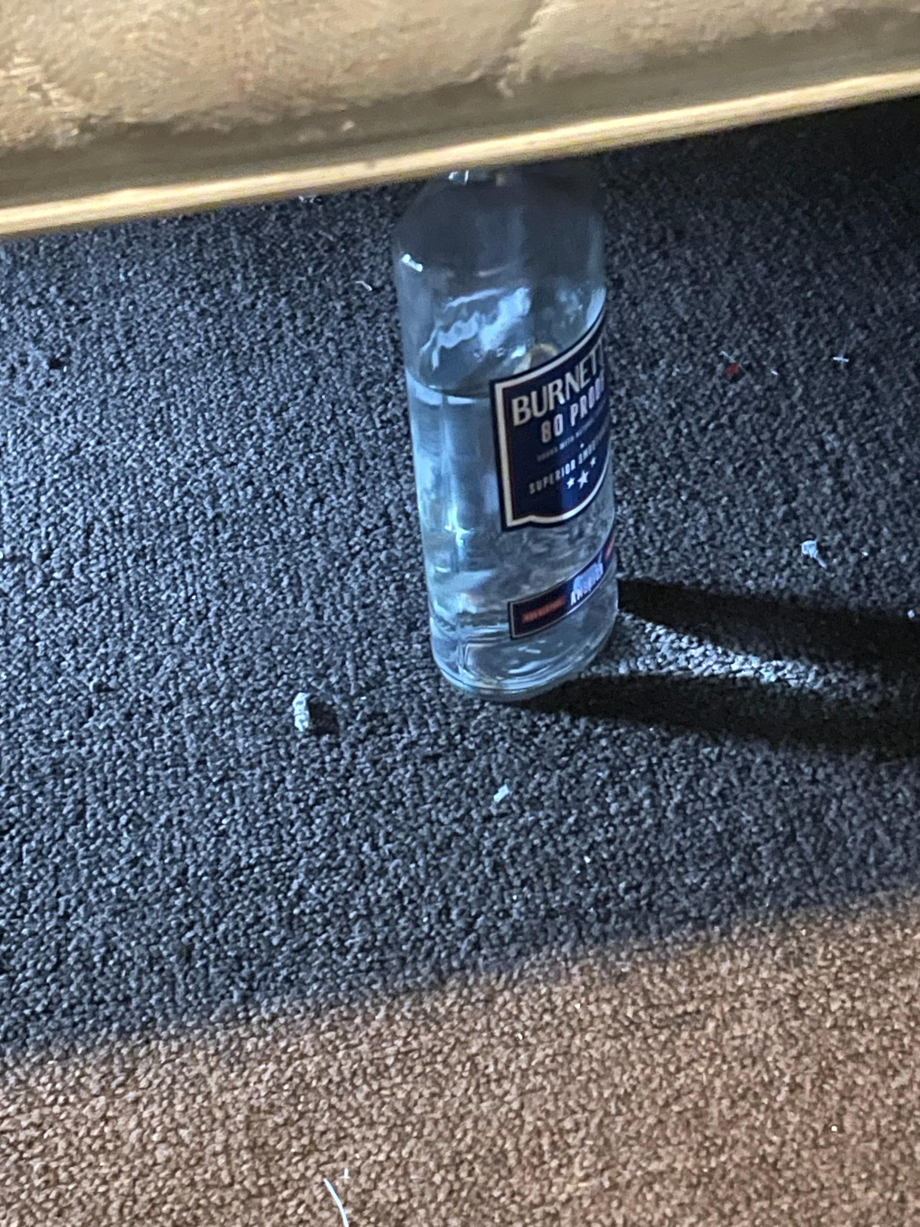 So clean a bottle of 80proof liquor was under the bed