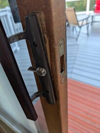 Broken patio door handle.