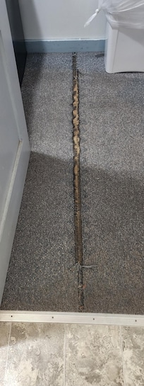 The carpet was torn.