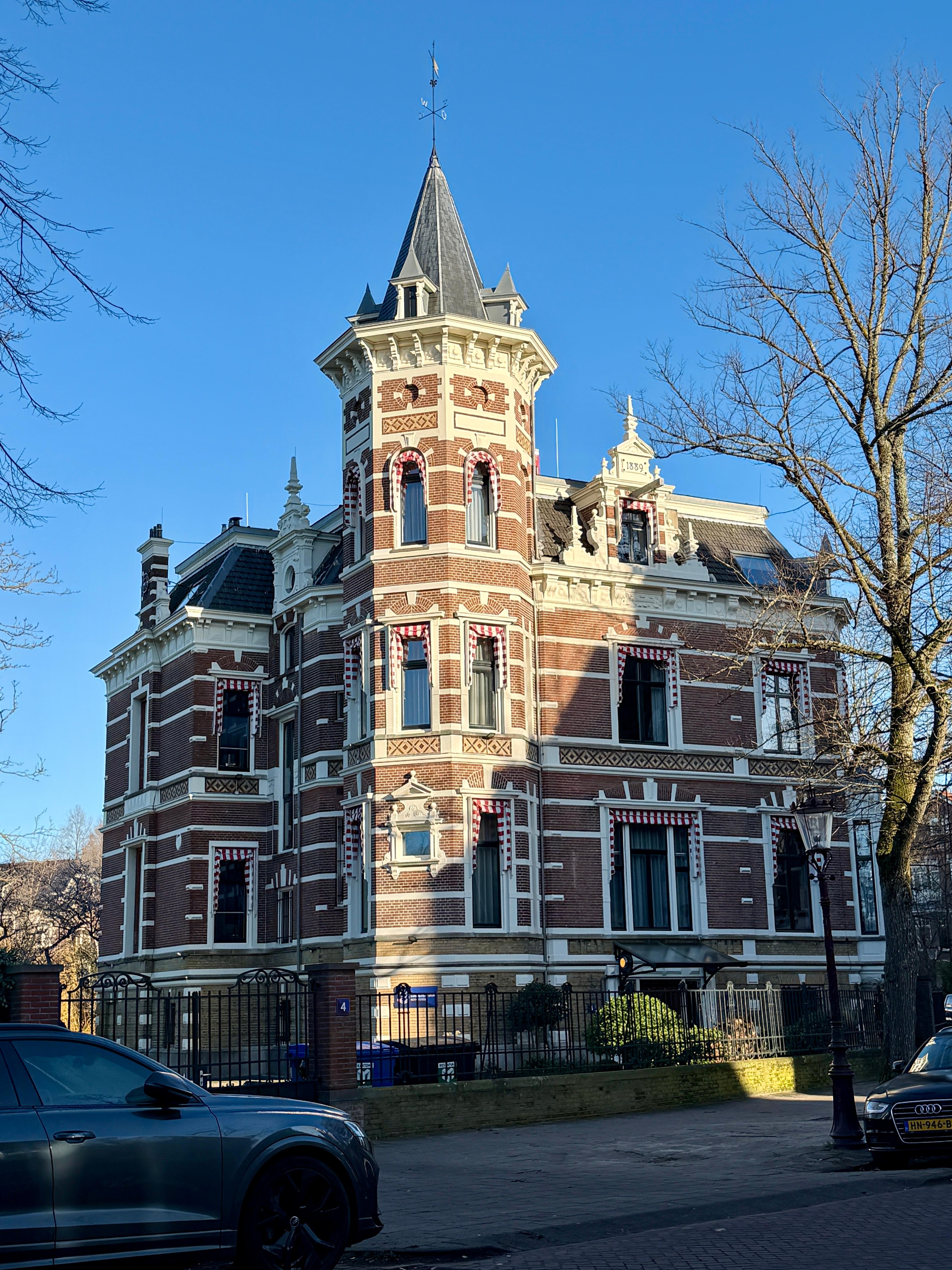 Across the street from the entrance.