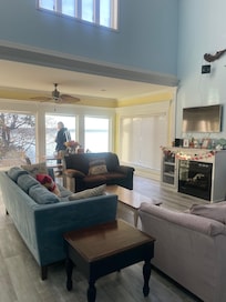 Living and dining room. Lots of seating.