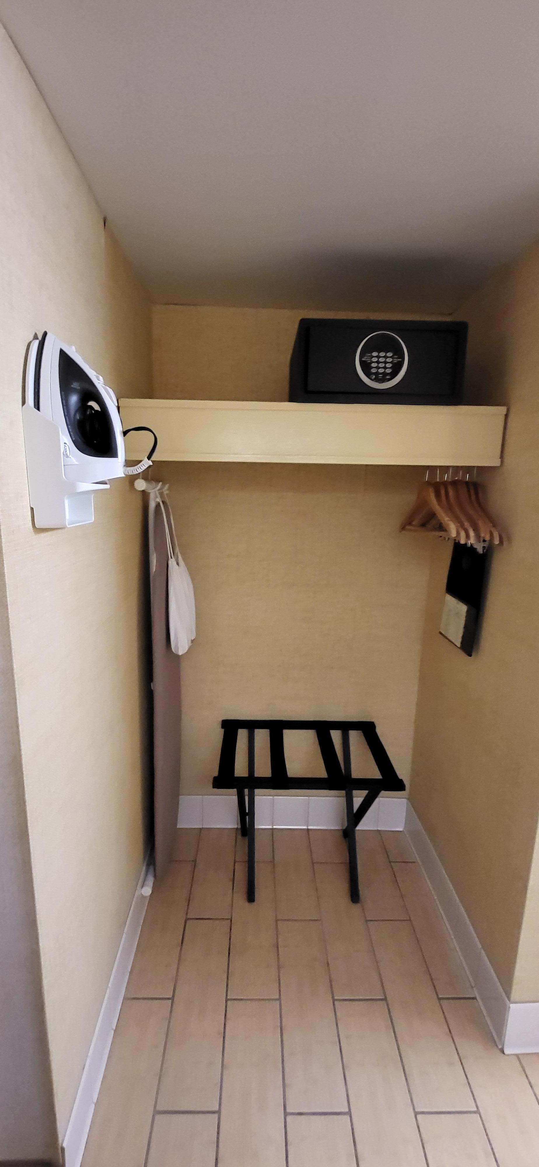 The safe, iron/ironing board & hair dryer