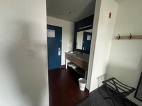 Bathroom sink by the door.