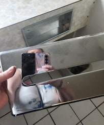 Cover on tissue box broken off and placed on closet shelf