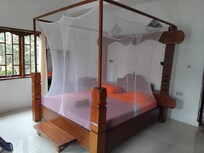 Divine wooden bed fit for a princess