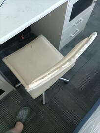 The chair has seen better days.