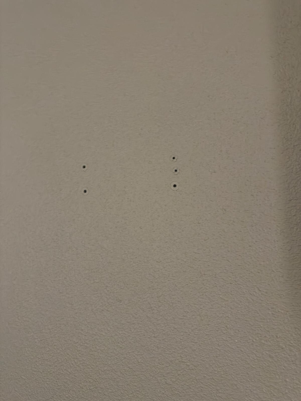 Hotels in the popcorn drywall and slatted ceiling not show in photos 