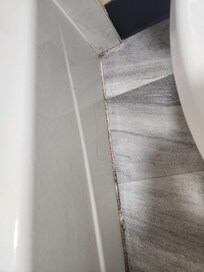 Dirty and moldy bathroom  floors.