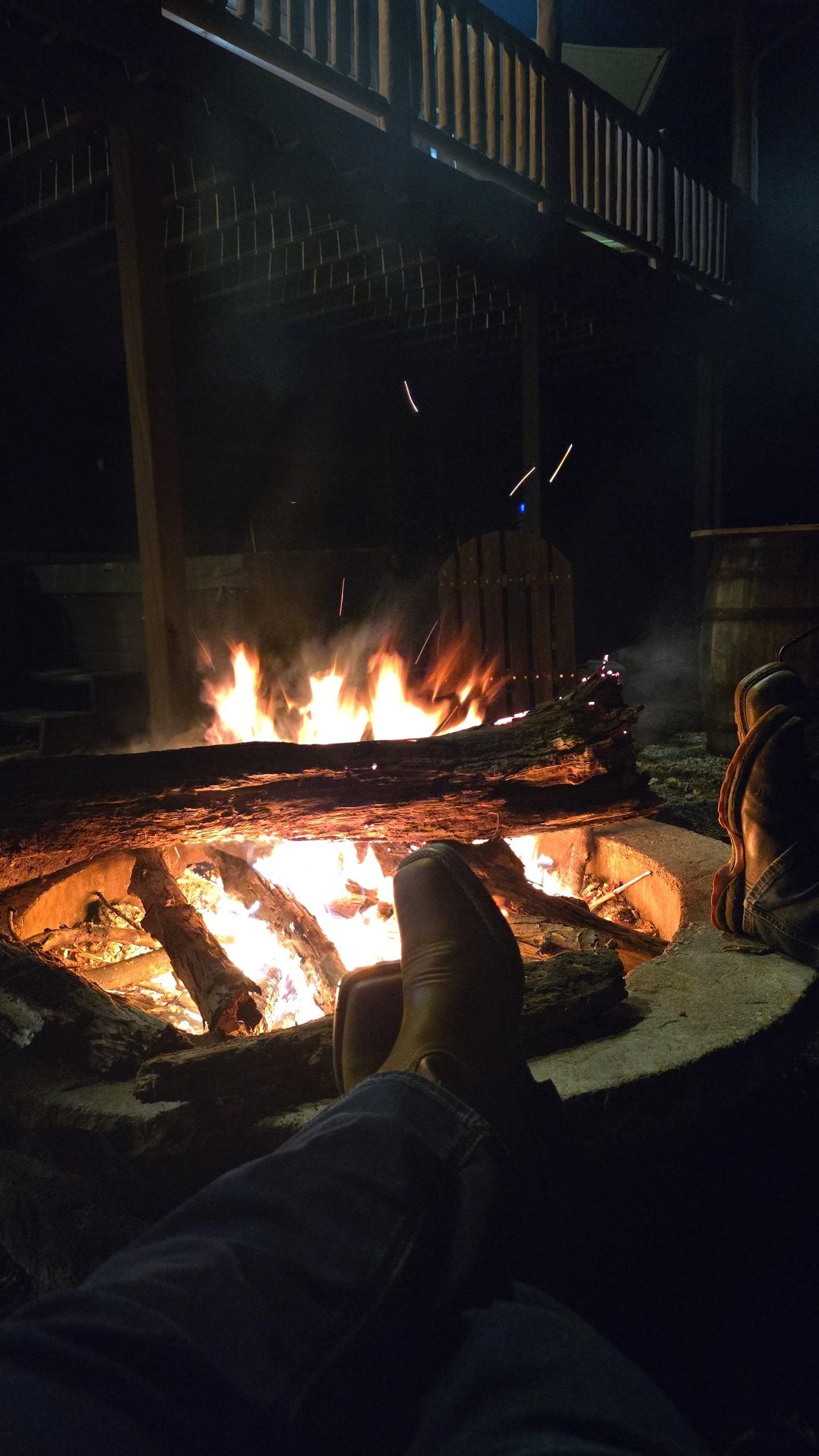 Enjoying the fire pit next to the hot tub
