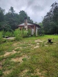 Abandoned buildings on the walk to river.