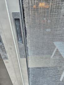 Sceendoor ripped leading to deck.