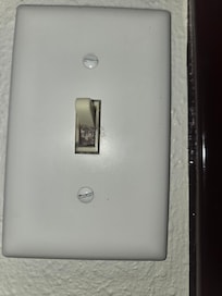 The room was very dirty. No dusting anywhere. An example here is the light switch. There is caked on dirt.