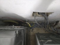 Dryer not connected to vent properly. Extremely dirty behind the dryer