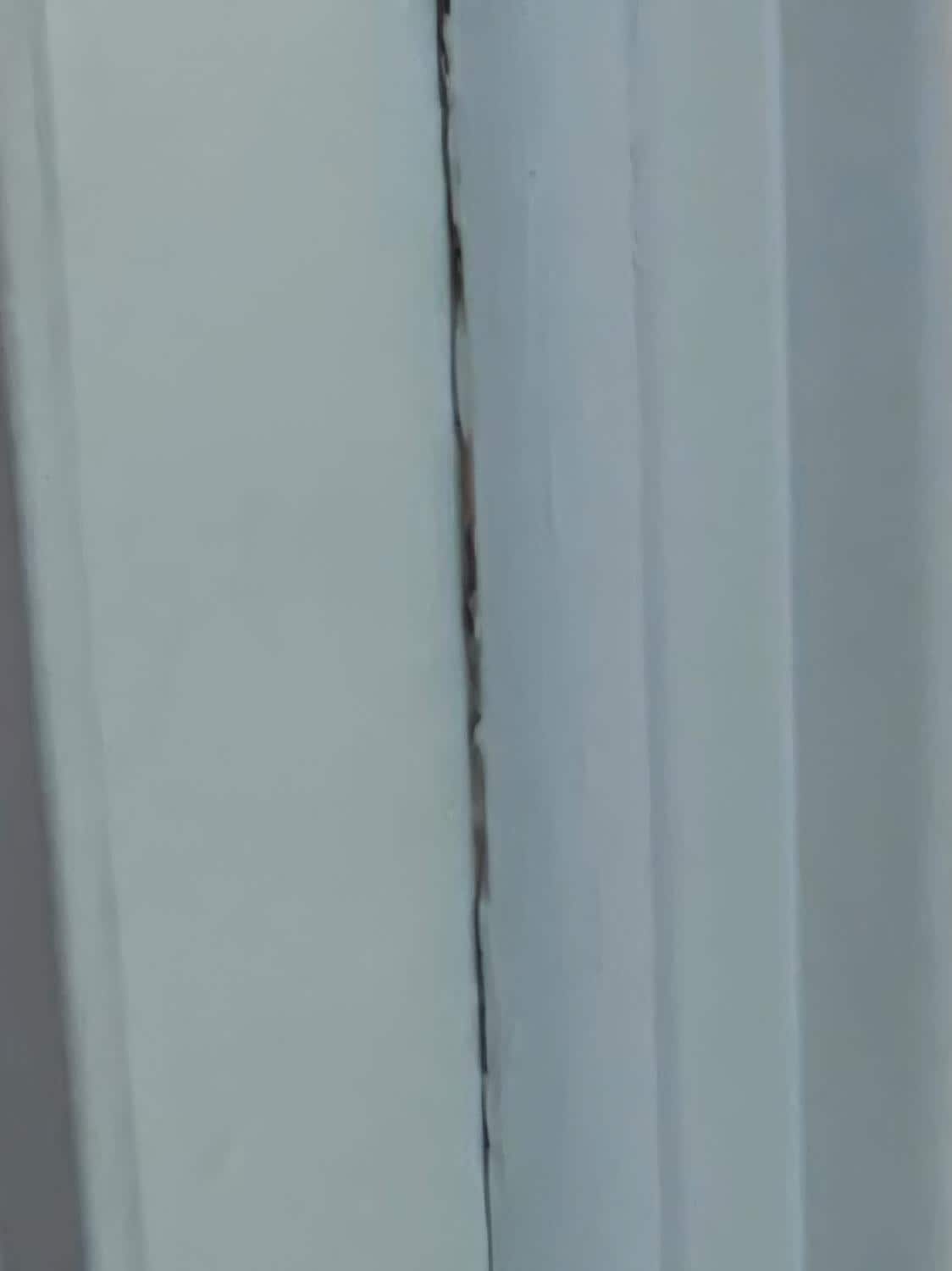 Looked like black mold in the seams around the door.