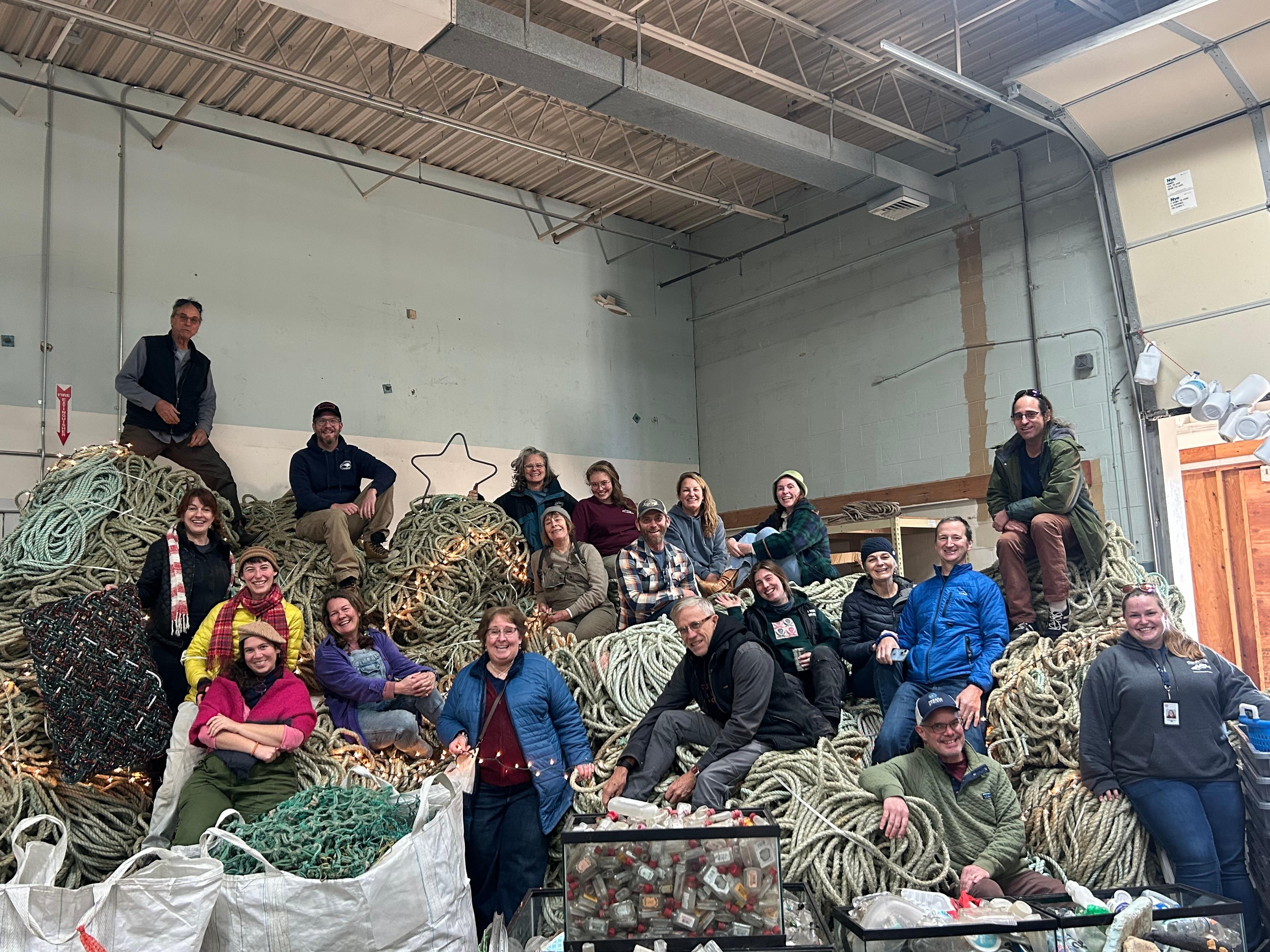 Our group along with several artists at the Net Your Problem warehouse.