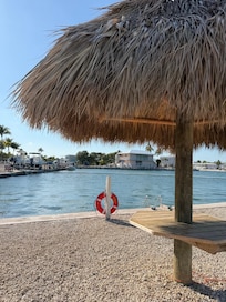 Picnic area by the swimming lagoon and pool.