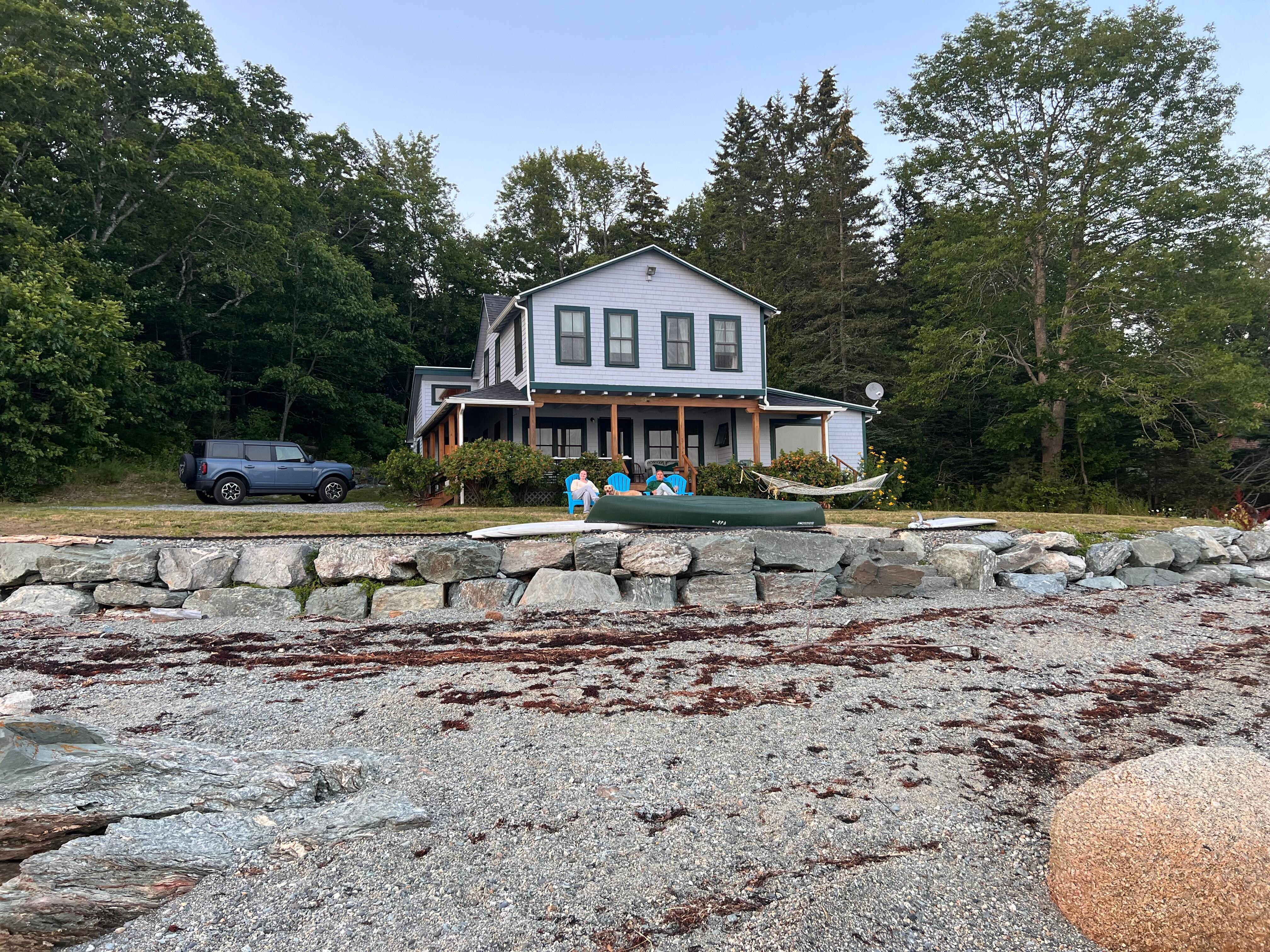 A view from the shoreline looking back at the cottage. 