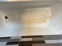 Dirty stained tub