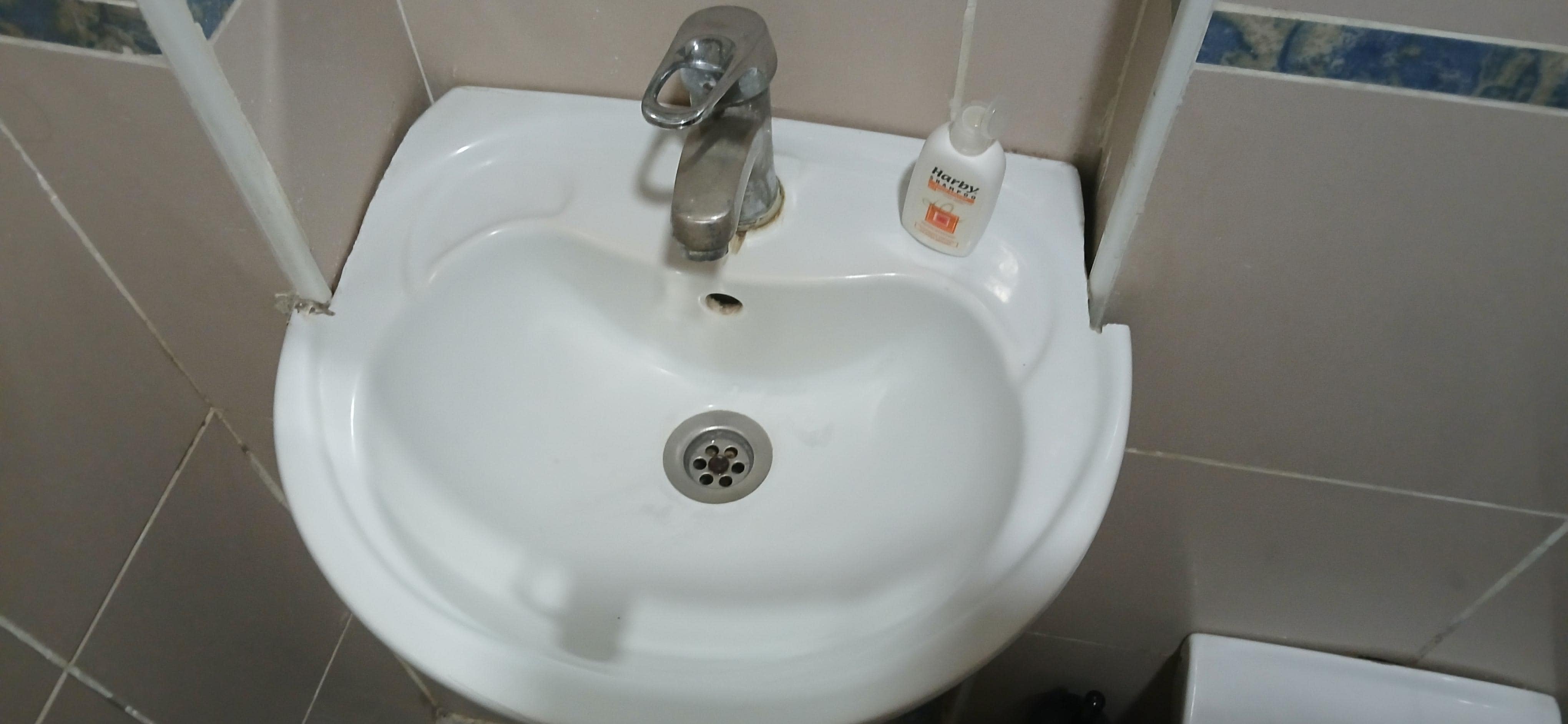 Sink cut to fit.  I've never seen anyone cut a sink. 