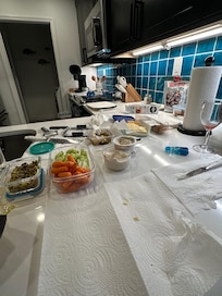 We were able to sit at the bar, pulling out all of our charcuterie items and enjoying this classically, clean kitchen!