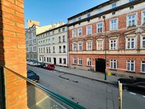 Hotel room facing a quiet street. Nice view.