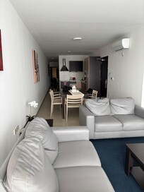 Living room, equipped kitchen. Dining room