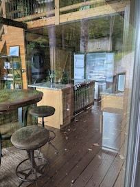 Other picture of kitchen from back porch. We could not get into the property