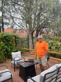 Back patio by fire pit with red rock views.