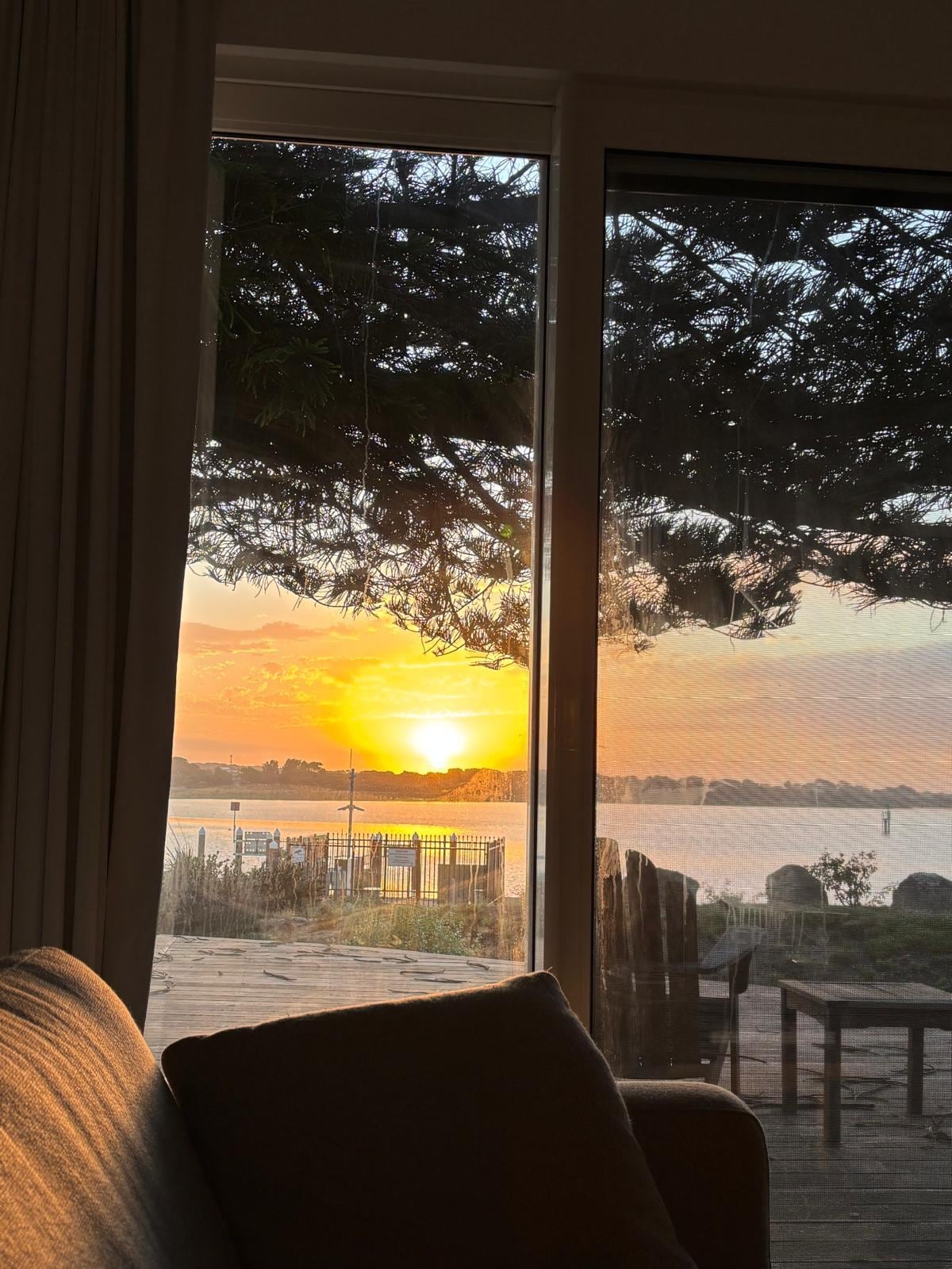 Sunrise from cottage lounge room.