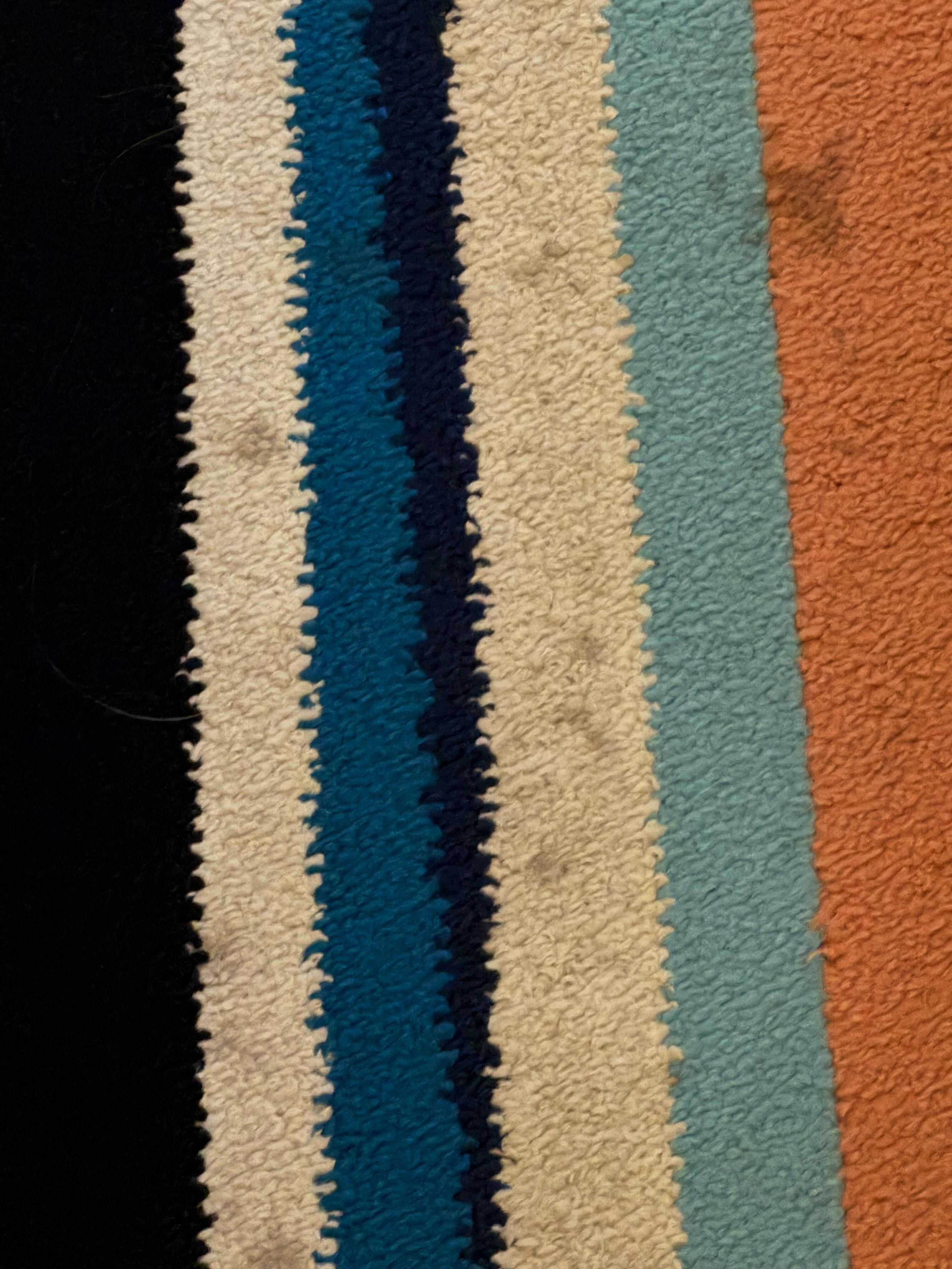 Nasty rug in room with stains