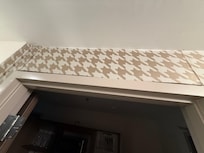 The wallpaper and shower is the area affected by the black mold and mildew. The wallpaper was is noticeably lifted and peppered with black mold. Also the ceiling has evidence of water leakage.