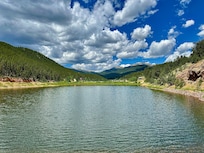 View of the house from across the lake. (First house on right hand side)
