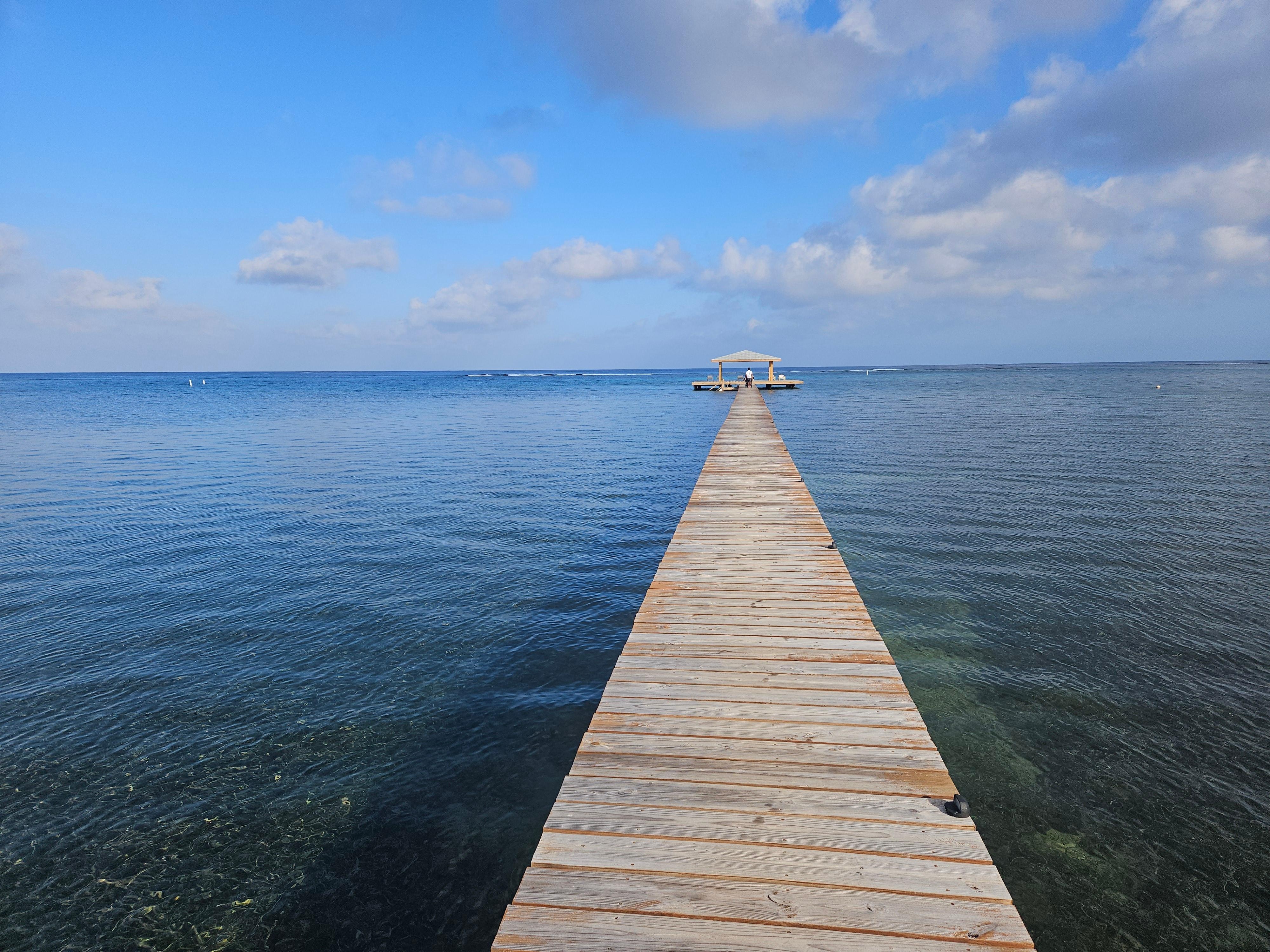 View down pier after blue door.