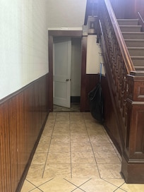 The hall to the downstairs bathroom.