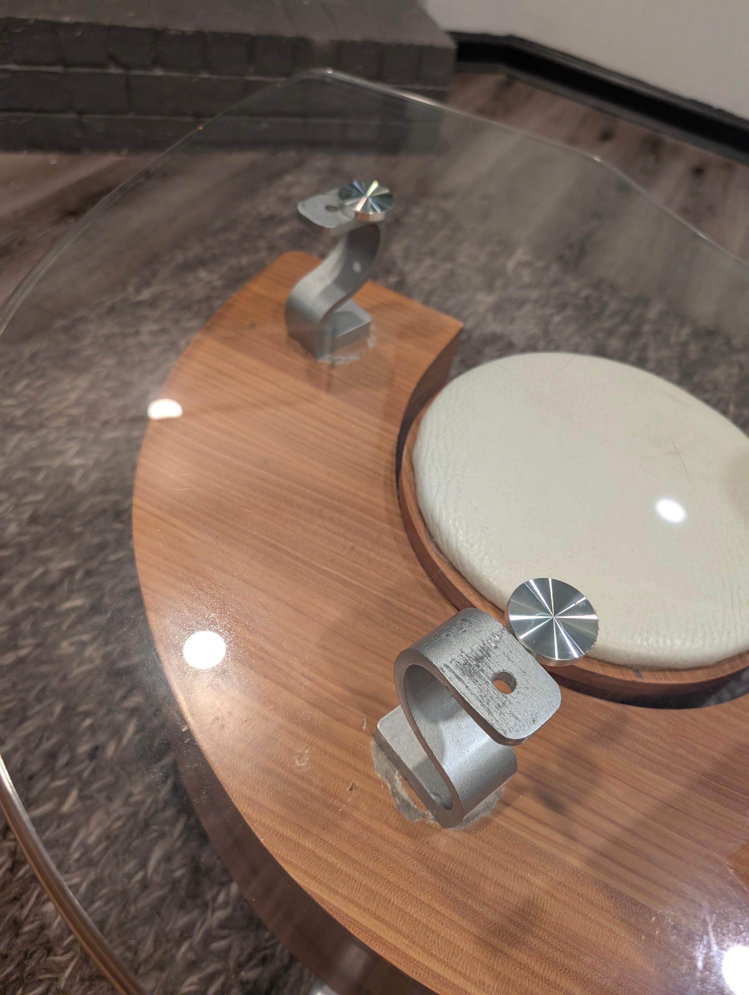 Glass on table not secured.