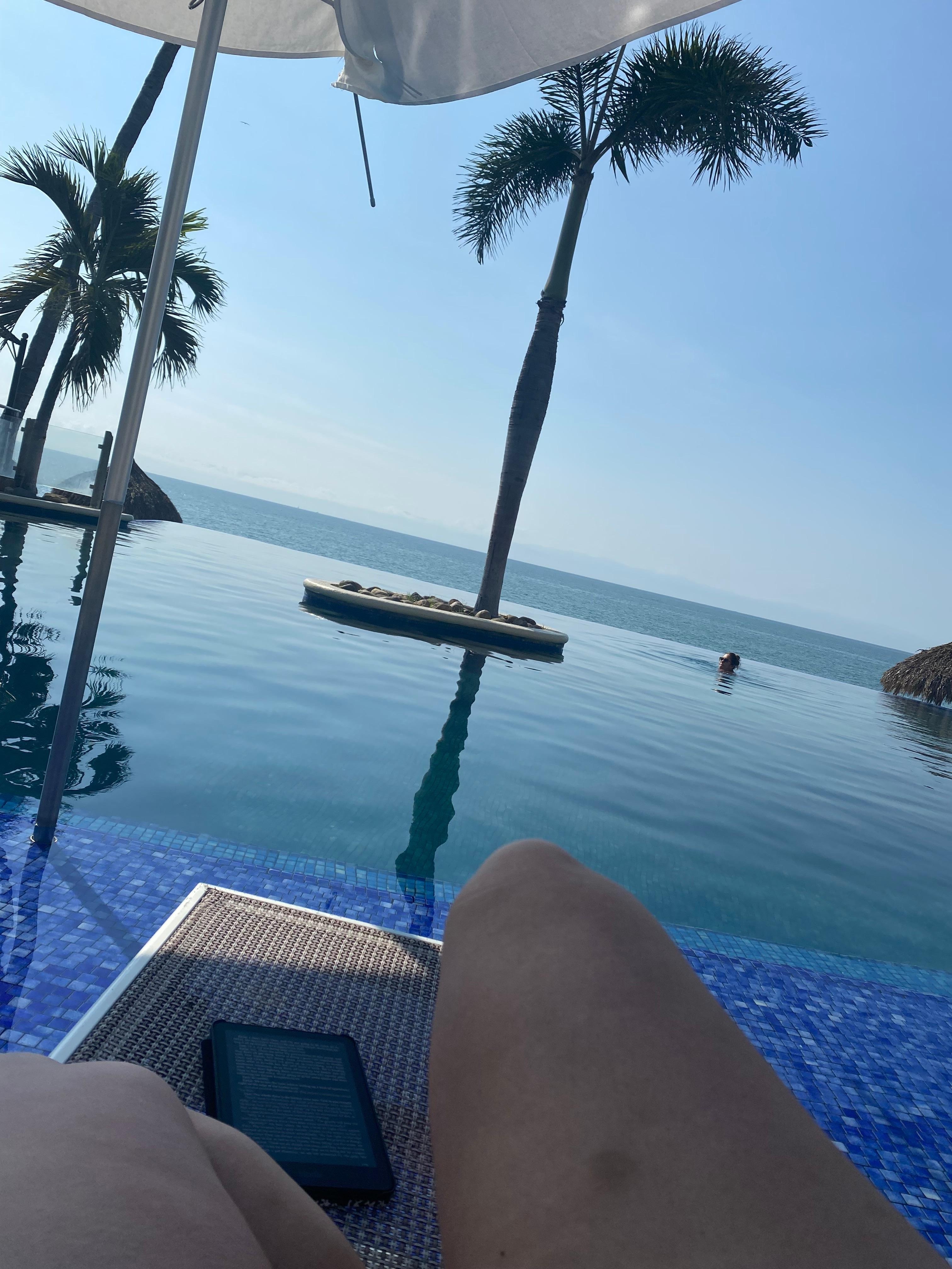 Shaded loungers in the pool. 