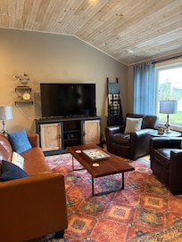 Cozy and spacious living room. Puzzles and games are in this area.