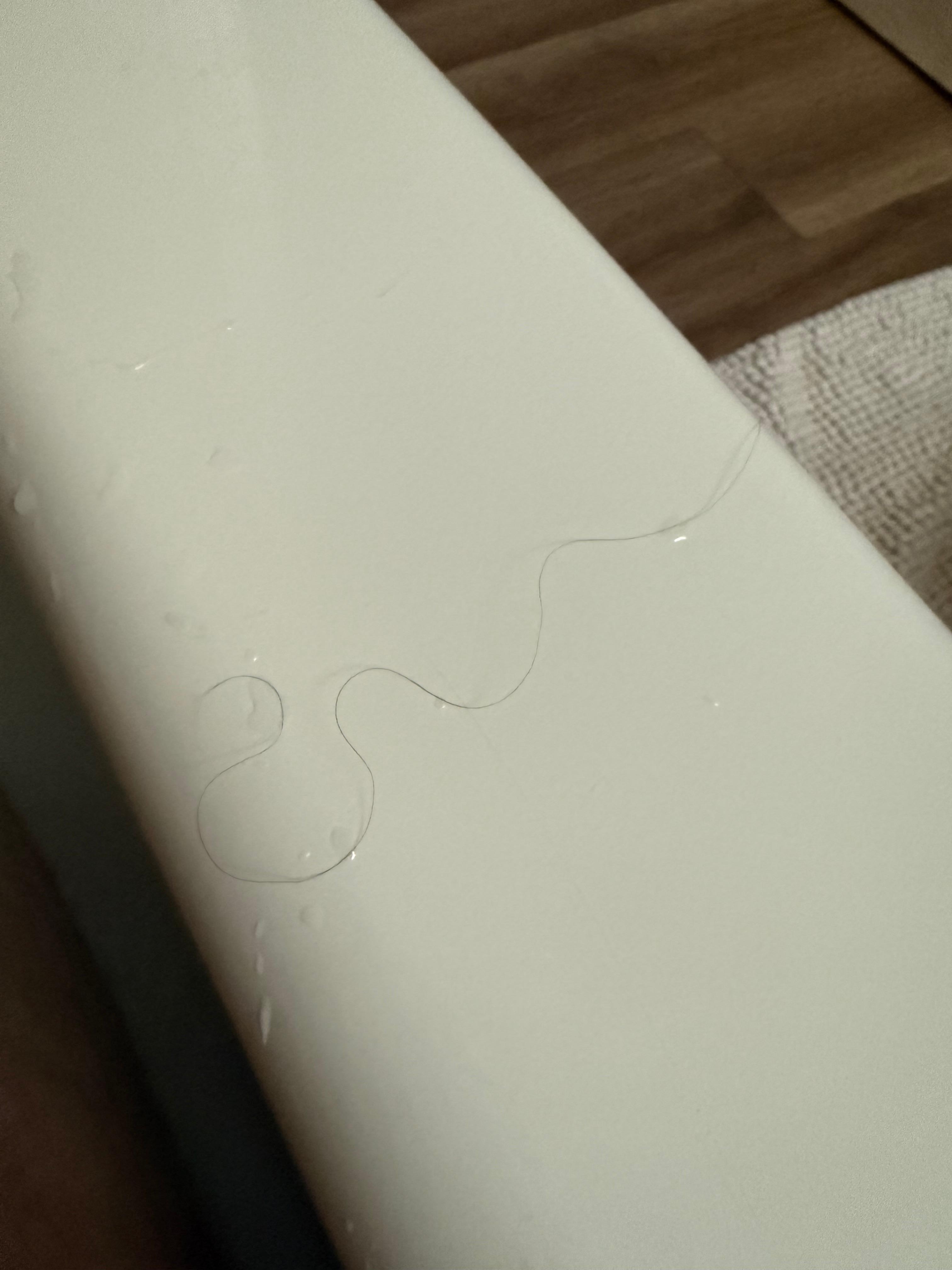 Long black hairs in the bathtub