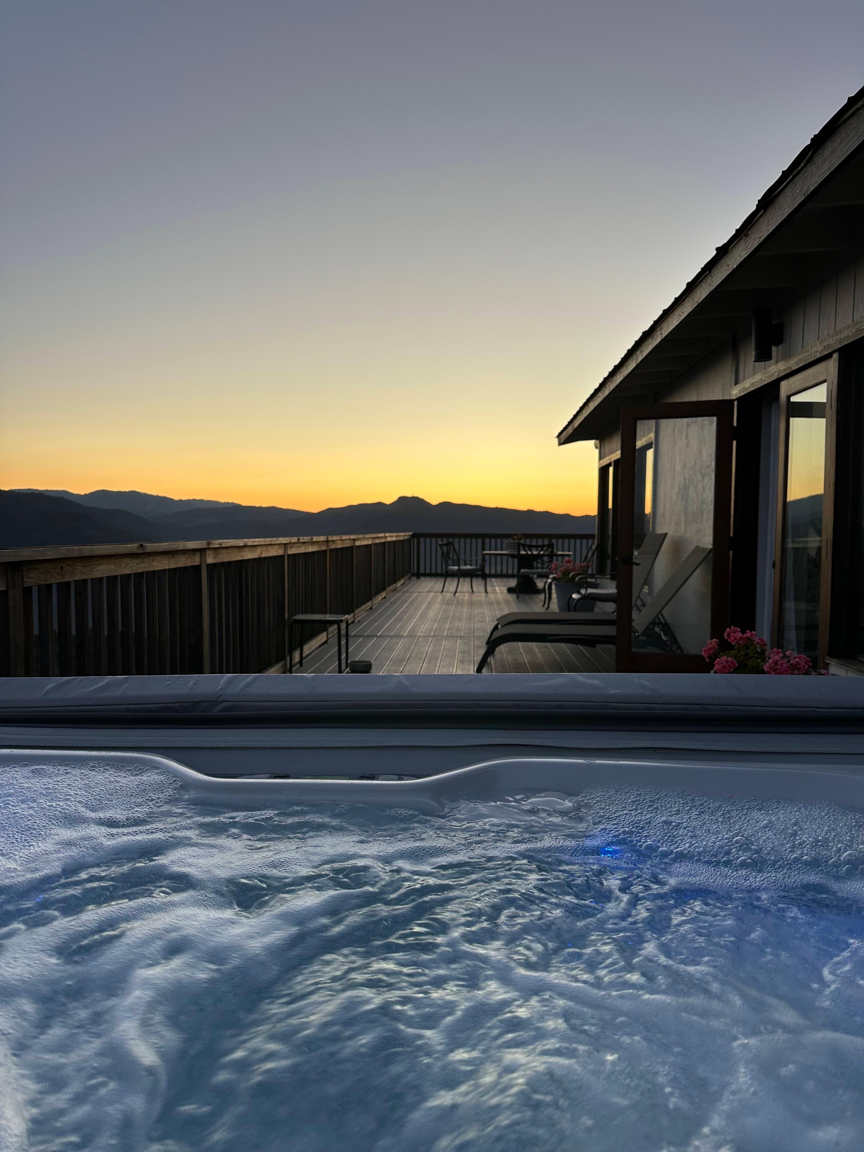 Sunset view from the hot tub towards the ocean