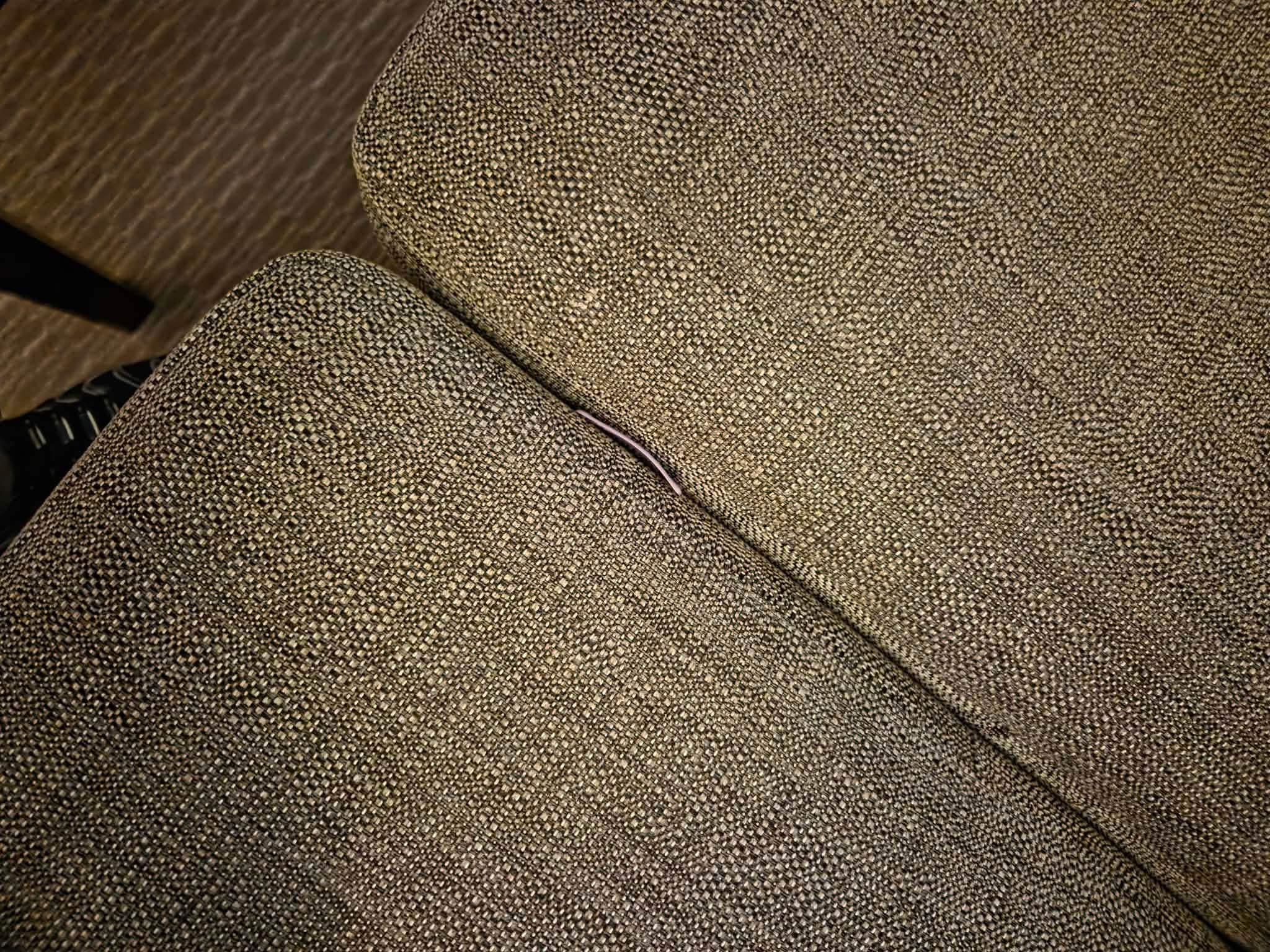 Clip that was left on bed under quilt ( fell between settee upon taking pictures). 