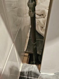 Behind sink