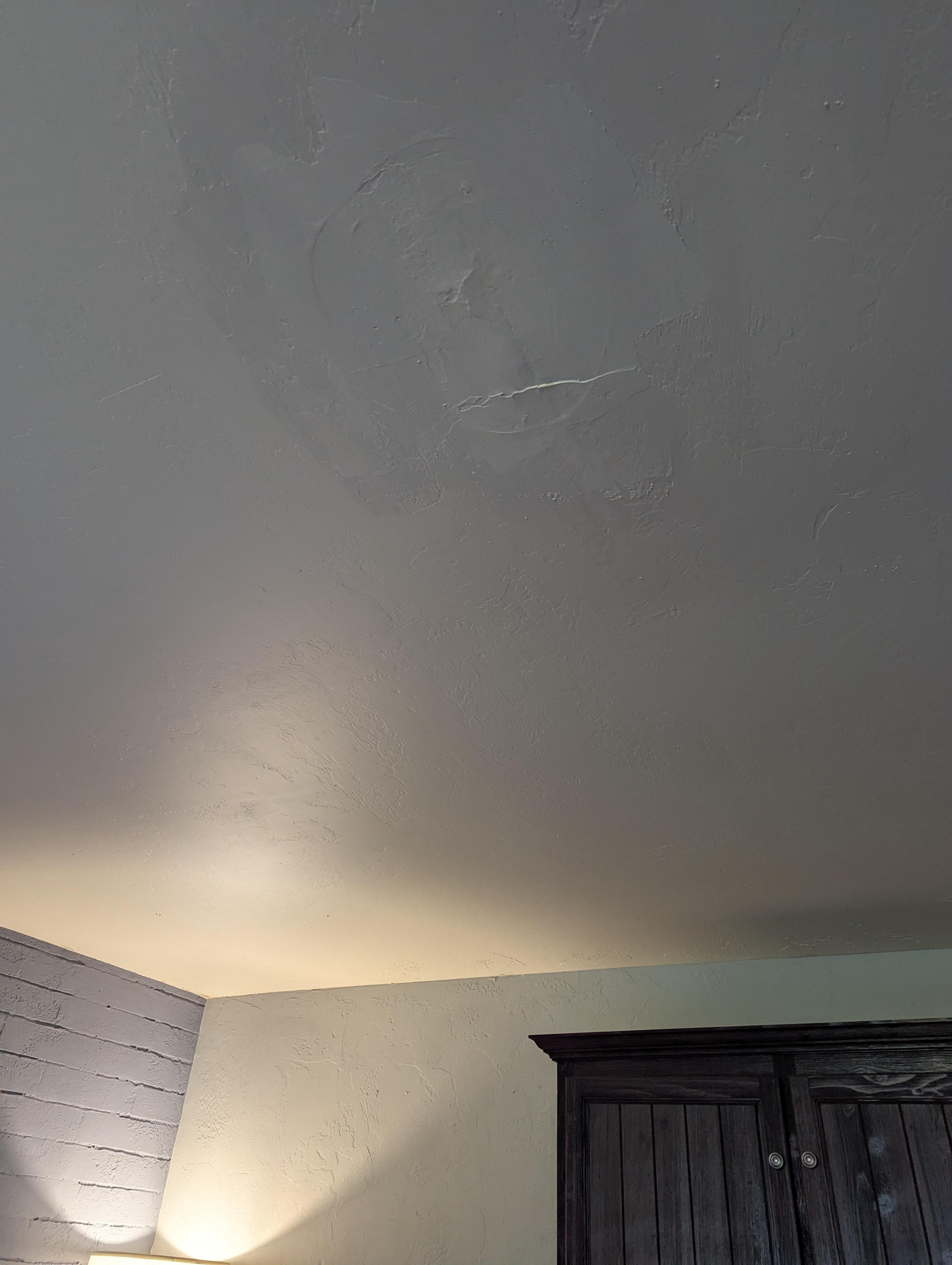 Disgusting ceiling with pink wet tissue stick to it and gross patch