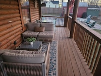 Back deck looking toward hot tub and game shed