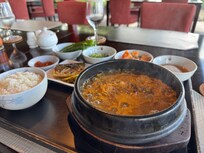 Spicy beef soup and mackerel for breakfast