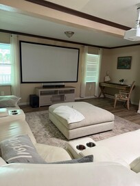 Large living room with big screen