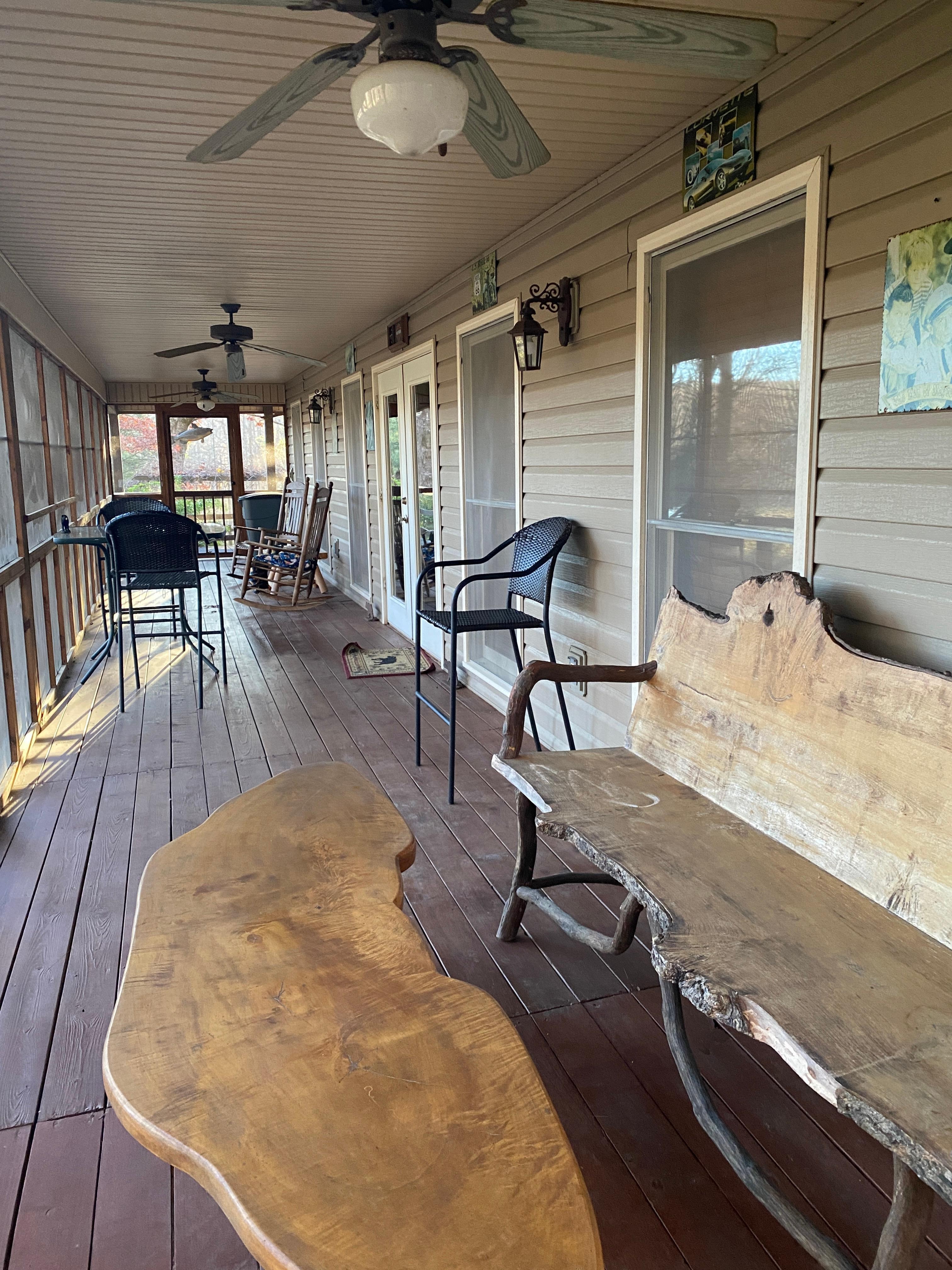 Large screened porch with view of the river and plenty of seating